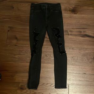 Next Level Stretch Black Ripped Jeans from American Eagle